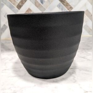 Decorative flared pot. Dark gray. Ceramic.